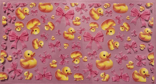 Rubber duck with pink bow wrap